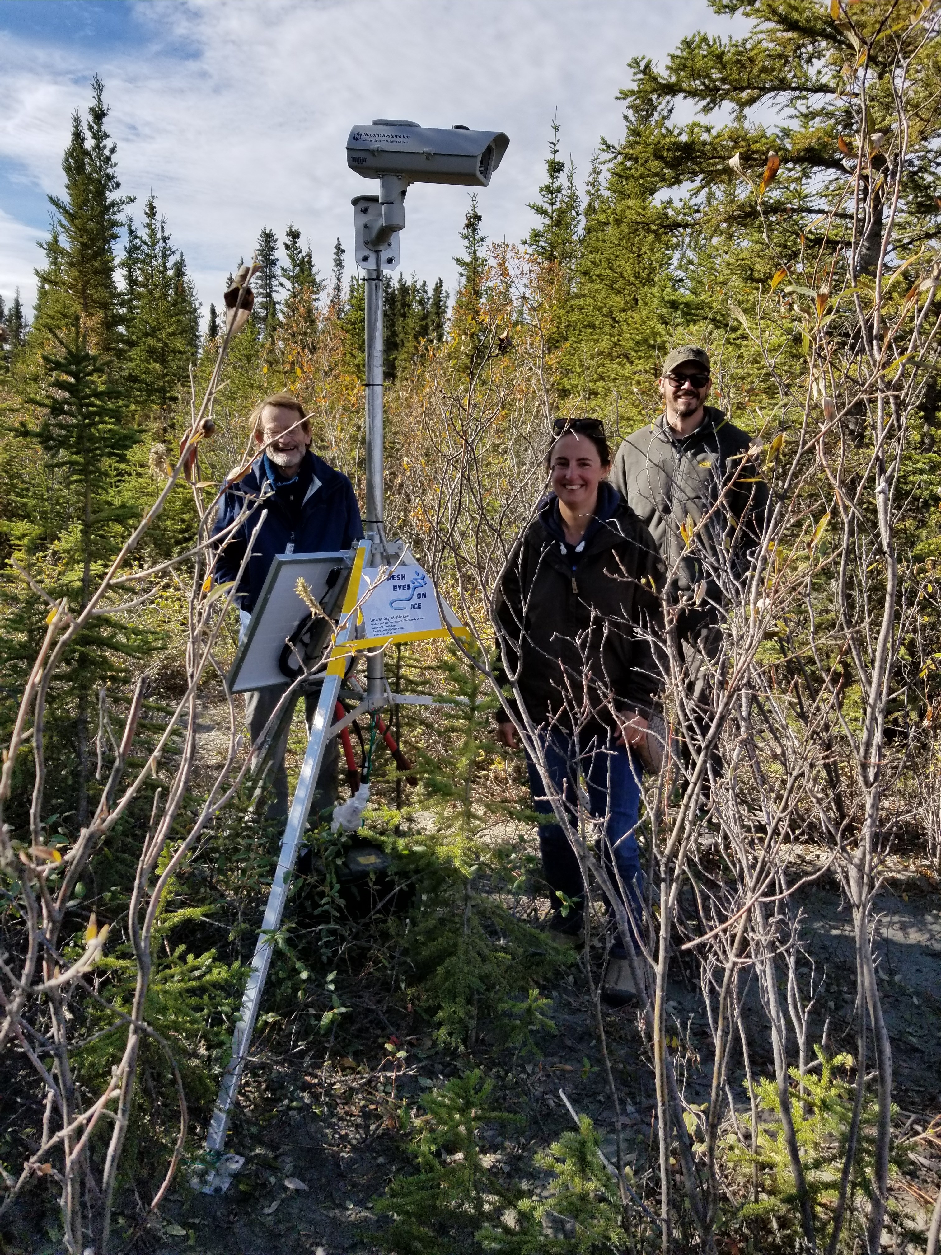 Allen Bondurant setting up a new ice observation camera on the Copper River with the help of Wrangell St. Elias NP scientists Caroline Ketron and Paul Atkinson