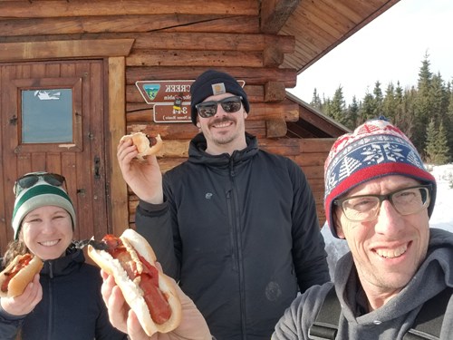 Eating bacon dogs at Bear Creek cabin