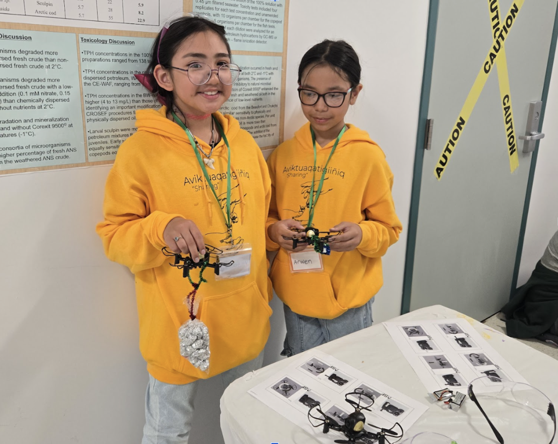 Kids holding Drones they built themselves. 
